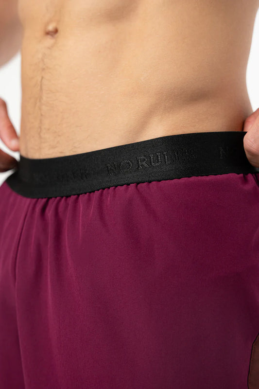 Short Running Pro Retro Berenjena